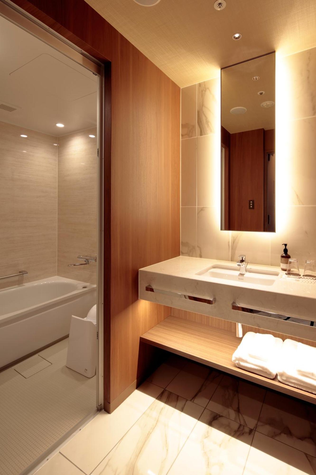 Candeo Hotels Kumamoto Shinshigai Rum bild