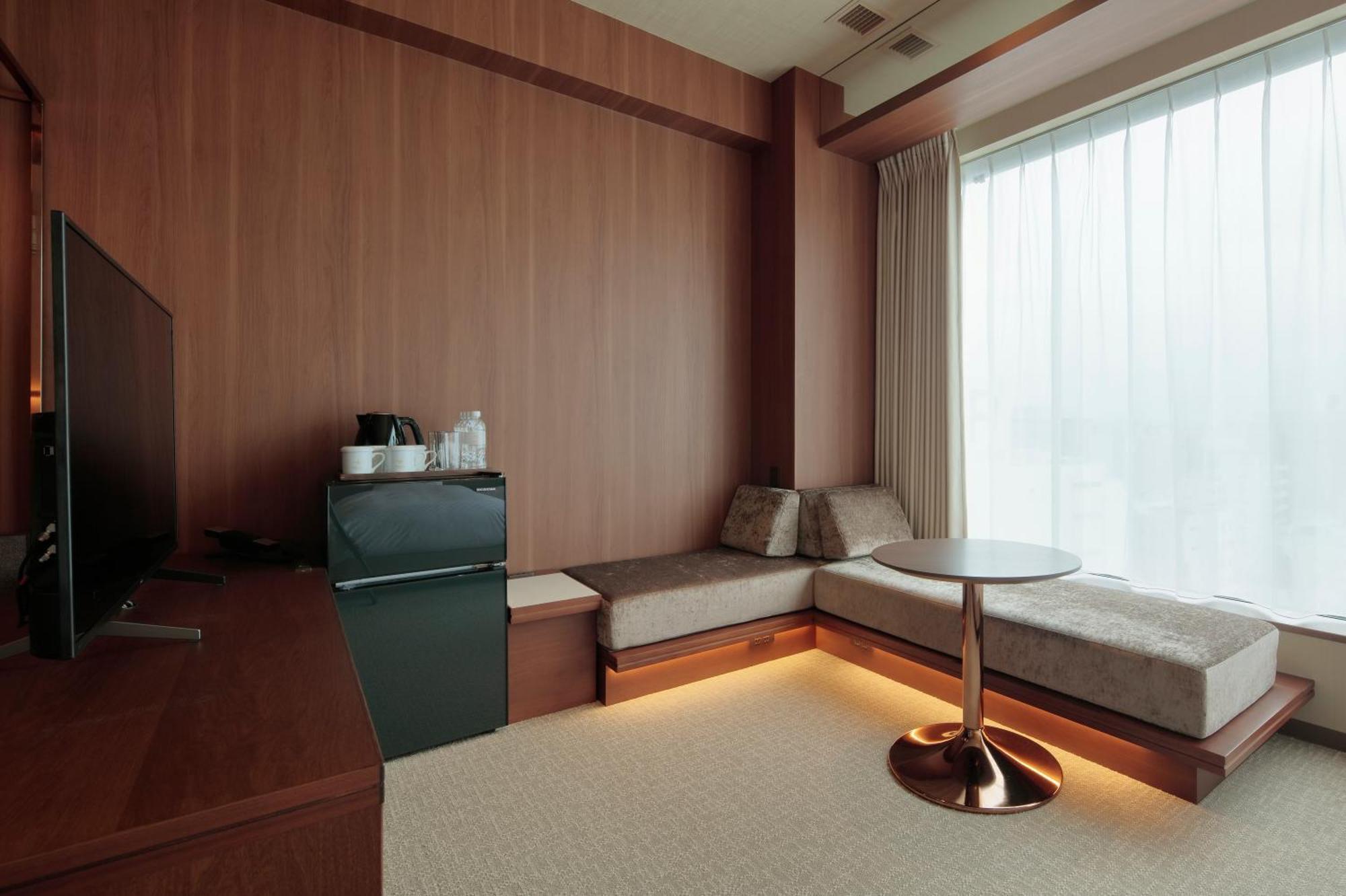 Candeo Hotels Kumamoto Shinshigai Rum bild